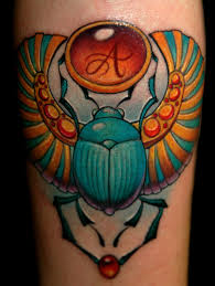 The Symbology Of The Scarab Beetle Tattoos Tattoo Life Scarab tattoos can take on any form the bearer desires from traditional egyptian depictions to contemporary and stylized drawings. symbology of the scarab beetle tattoos
