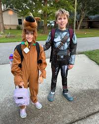 Hoco week day one- Scooby and Mandalorian for movie character day.