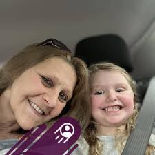 Looking for a young lady with blue hair and glasses who rode the zipper  ride at the fair with my daughter?