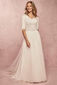 Rebecca Ingram Connie Leigh This Soft And Romantic Modest Wedding Dress Features An Allover Modest Bridal Gowns A Line Wedding Dress Modest Wedding Dresses