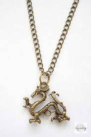 Antique Bronze Chinese Zodiac Year Of Dragon Charm Necklace Etsy Chinese Zodiac Dragon Necklace Zodiac Years
