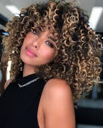 Lady modeling this highlighted hair has the rest of the hair jet black in color only a portion on one side with the natural burgundy tinge. 61 Trendy Caramel Highlights Looks For Light And Dark Brown Hair 2020 Update