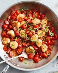 Nyt Cooking On Instagram Perfect Summer Dinner Alert The Recipe For Seared Scallops With Jammy Cherr Nyt Cooking Scallops Seared Cherry Tomato Recipes