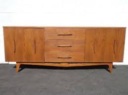 This covers anything with a sleek appearance that would go great in modern homes. Mid Century Modern Dresser Mid Century Teak Tv Media Console Furniture Cabinet Ebay