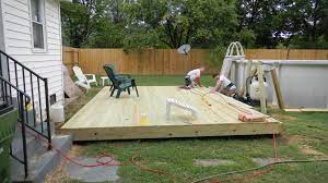 Ground Level Deck And Pool Pump House For Above Ground Pool Above Ground Pool Decks Ground Level Deck Pool Deck Plans