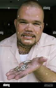 Local jeweler Earl "Cadillac" Hunter shows off some of his dental grills he  has made, May 23, 2006, in Wichita, Kansas. (Photo by Jeff Tuttle/Wichita  Eagle/KRT Stock Photo