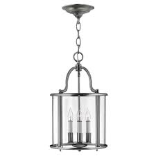 The piedmont collection includes several sizes of lanterns that look great together or even. Gentry 4 Light Medium Lantern Pendant In A Pewter Finish And White Candle Sleeves Hinkley Hk Gentry P M Pw