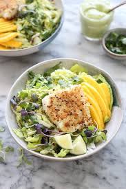 Set aside to marinate while you prepare the taco bowls. Healthy Fish Taco Bowls With Avocado Slaw And Mango Gluten Free