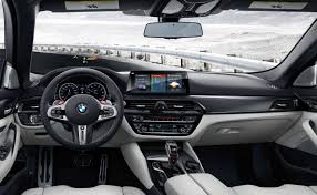 Interior Of The Bmw M5 In Silverstone Full Merino Leather Showing Idrive 6 0 And M Specific Head Up Display Bmw M5 Bmw Sedan