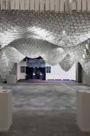 Beautiful Ceiling Installation Made Of Paper Tube Paper Chandeliers Home Building Furniture Ceiling Installation Paper Chandelier Contemporary Fireplace
