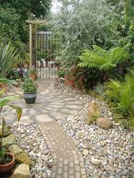 When designing your garden walkway, gravel, pebbles and mulch all have pros and cons. Gravel Garden Ideas Circle Leading To Courtyard Pebble Landscaping Garden Design Garden Pathway
