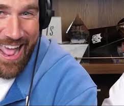 So the new album is called Life of a Showgirl and in the clip of the New  Heights podcast we saw 4 books/cassette tape cases in the 4 colours of her  crochet