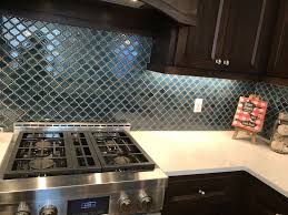 Brilliant Teal Lantern Tile Adorns This Kitchen Backsplash Designer Nicole Fisher Photographer Olivia Hettrich 2017 In 2020 Floor Coverings Lantern Tile Flooring