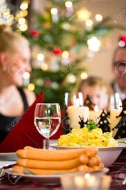 It is the time when father christmas (santa) comes. Traditional German Christmas Eve Dinner Wiener Sausages And Potato Stock Photo Picture And Royalty Free Image Image 33473515