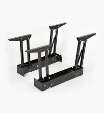 This sleek black coffee table features two drawers in the front, and the top pops up to reveal even more stowaway space underneath. Pop Up Dining Table Kit Lee Valley Tools