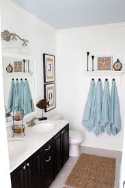 Here are some great ideas for coastal and nautical bathroom mirrors. Coastal Bathroom Decor Beach Theme Bathroom Blue Ceiling