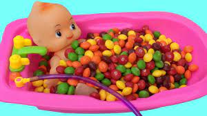 Your baby's first bath can be a time filled with smiles and laughter or tears and wails; Baby Doll Bath In Skittles Candy Pretend Play Youtube