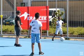Krajicek Playground het blauwe veldje' door en voor de buurt