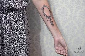 50 reflection tattoo ideas for men mirrored designs. Ornamental Style Mirror Tattoo On The Left Forearm
