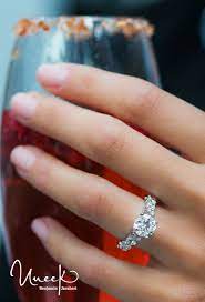 Uneek Jewelry Roundcut Diamond Engagementring With Extra Large Melee Diamonds Shared Prong Set On Upper Sha Uneek Jewelry Engagement Dream Engagement Rings