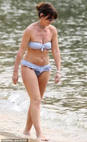 Get the latest on davina's shows and charity projects: Davina Mccall 52 Hits The Beach For A Sunny Festive Trip To Australia