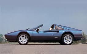 Finished in light metallic silver grey (argento nurburgring) with mid blue hide(4307) and dark blue upper dashboard,door cappings,steering wheel (3282) and dark blue carpets. 50 Years Of Magnificent Mid Engined Ferraris Autocar