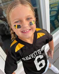 Sporting her vintage Tim Dwight #6 wing jersey at school today..Go Hawks!"  #HHShoutOut