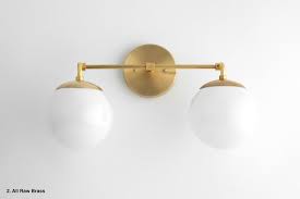 Decorating bathroom in the style of mid century modern must be matched to suit the concept of your house. Mid Century Modern Bathroom Vanity Light Online