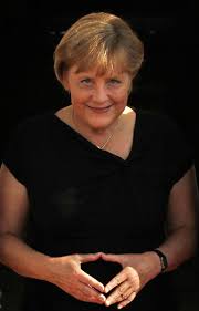 German chancellor angela merkel has come to be known for a certain hand gesture that involves elbows bent at the waist with thumbs and fingertips touching, forming the shape of a triangle or diamond. Introducing Your New Favourite Emoticon The Merkel Raute Indy100 Indy100