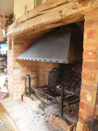 Fireplace Hood Goudhurst Michael Hart Blacksmith Appliances, bathroom decorating ideas, kitchen remodeling, patio furniture, power tools, bbq grills, carpeting, lumber, concrete, lighting, ceiling fans.