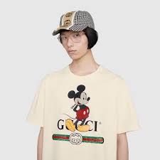 Browse amongst monogram bags, gg belts or indulge in gucci guilty to tap into the brand's legacy. Disney X Gucci Oversize T Shirt In White Cotton Gucci Uk