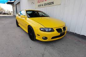 Image result for Yellow 2004 Pontiac