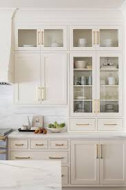 Goes with any decor choices and gives your kitchen area an elegant overall look. Brass Pulls On Ivory Shaker Kitchen Cabinets Transitional Kitchen Kitchen Design Kitchen Renovation Interior Design Kitchen