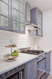 Gray Ikea Kitchen Cabinets With White Beveled Subway Tile Backsplash Transitional Kitchen Kitchen Remodel Small Kitchen Design Small Glass Kitchen Cabinets