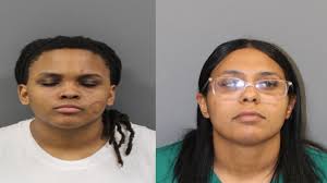 Police: Two women waved a loaded gun at customers after 'heated' argument