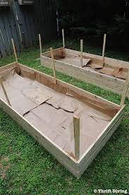 How to construct a raised garden. How To Build A Diy Raised Garden Bed And Protect It With A Metal Fence