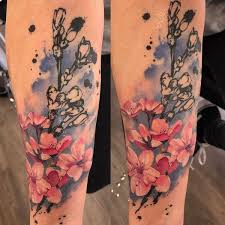 Cherry blossoms with decorative swirls and pretty butterflies looking so pretty here. 65 Small Cherry Blossom Tattoo Ideas