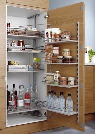Un Rangement Optimise Avec Les Organiseurs De Cuisine Home Decor Kitchen Storage Bathroom Medicine Cabinet