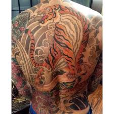 #tattoo #tiger #tiger tattoo #blackwork #black tattoos #lam hamilton #lam tattoo #black ink #body art #chest tattoo #chest piece #dotwork #line tattoo #line work #tiger drawing #tigertattoo. Rising Dragon Tattoos Nyc Now That S A Tattoo Full Japanese Tiger Back