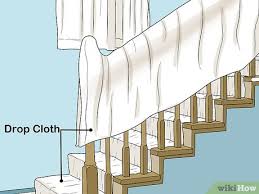 To reach stairwell ceilings for painting projects and other work, use an extension ladder as shown here. 3 Ways To Paint A High Ceiling Over Stairs Wikihow