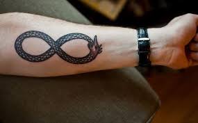Where did the ouroboros infinity symbol come from? 25 Overwhelming Infinity Symbol Tattoo Designs Creativefan Infinity Tattoo For Men Infinity Tattoos Infinity Tattoo With Feather