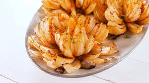 Grilled Onion Blossoms Are Summer S Low Carb Bloomin Onion Recipe Onion Blossom Recipe Summer Grilling Recipes Grilled Onions