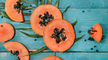How can you tell when a papaya is ripe to eat?