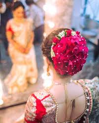 Big Bun With Rose Petals Indian Bridal Hairstyles Indian Wedding Hairstyles Bridal Hairdo