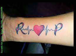 Tattoo Designs For Girls On Hand Heart Beats Name Tattoos On Wrist Initial Tattoo Tattoo Lettering Styles