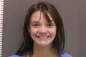 Woman faces attempted murder charges after allegedly attacking boyfriend  with hatchet while he slept