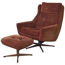 The base swivels 360 degrees and the chair can also recline. Scandinavian Modern Reclining Swivel Suede Lounge Chair And Ottoman By John Stuart For Sale At 1stdibs
