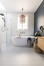 In homes by the sea, the bathroom can also reflect the home's run a border at chairrail height around the room, interspersing decorative tiles with field tiles. 25 Dreamy Coastal And Beach Bathroom Decor Ideas Shelterness