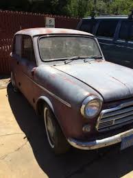 Image result for Maroon 1959 Datsun