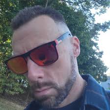 What is the purpose of a man running with a torch in Walpole?